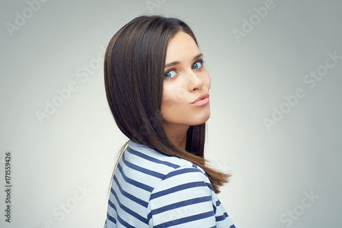 Funny portrait of girl showing duck lips.