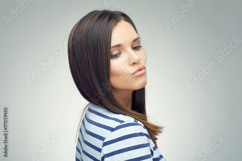 Funny portrait of girl showing duck lips.