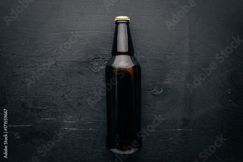 A bottle of beer. Top view. Free space for text.