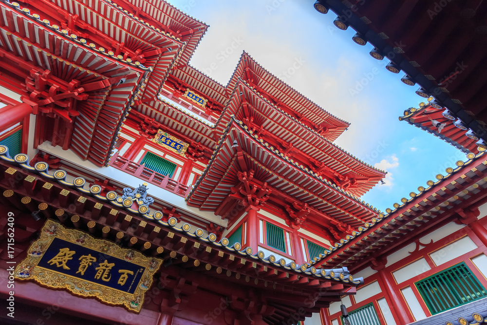 Buddha Tooth Relic Temple in Singapore Chinatown. The temple is a popular destination for tourists and pilgrims of Asia and built to house the tooth relic of the historical Buddha.