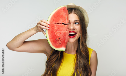  beautiful woman holding big slice of watermelon.