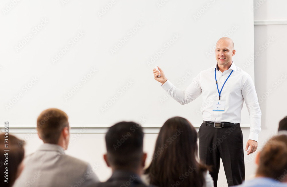 group of people at business conference or lecture group of people at business conference or lecture