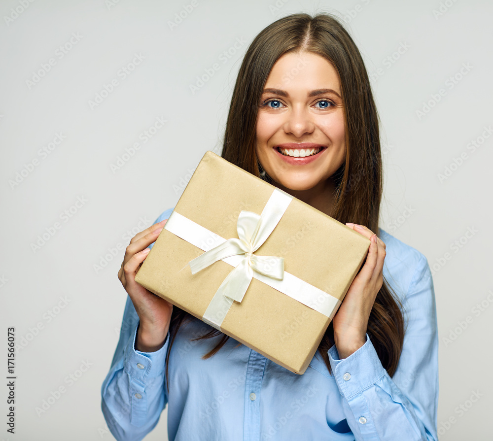 Happy business woman holding gift box. Happy business woman holding gift box.