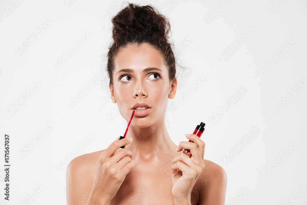 Close up beauty portrait of a pensive brunette woman Close up beauty portrait of a pensive brunette woman