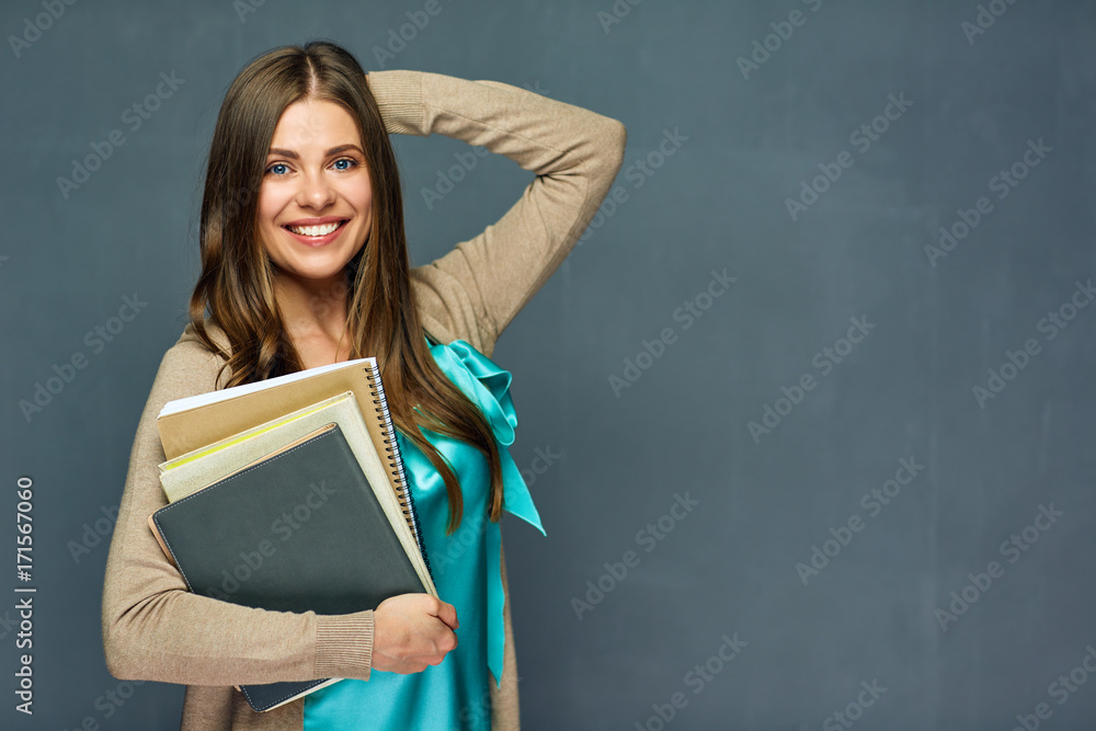 Smiling girl student or woman teacher portrait Smiling girl student or woman teacher portrait