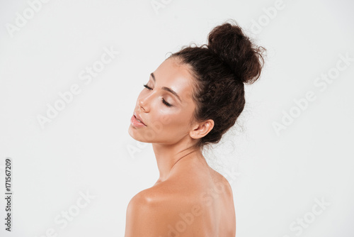 Side view beauty portrait of a beautiful young woman