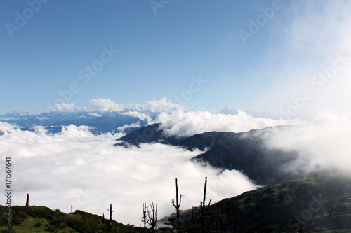Beautiful landscape of Himalayan ranges covered with white clouds, Sandakphu, West Bengal India