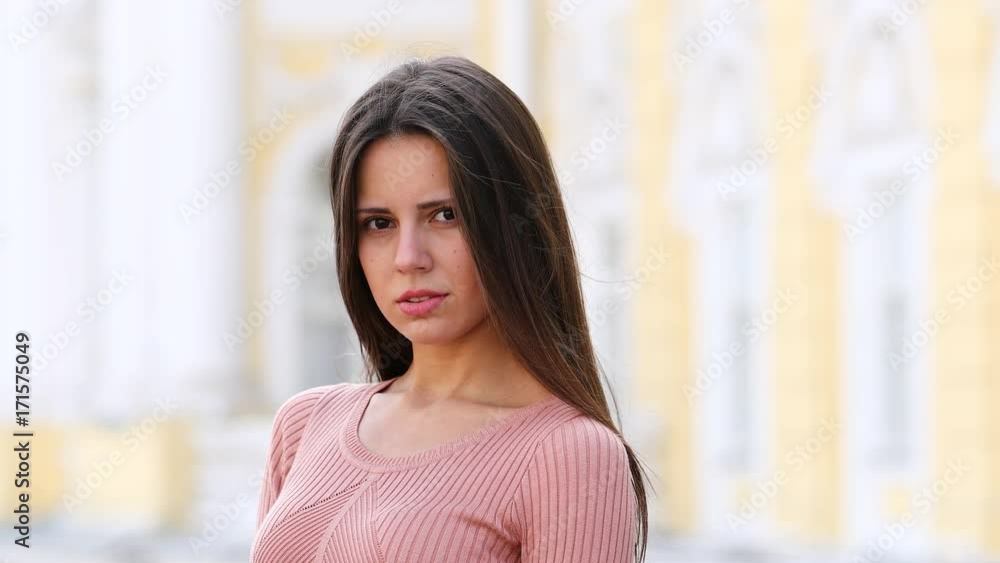 Happy model. Young brunette woman in dress Happy model. Young brunette woman in dress