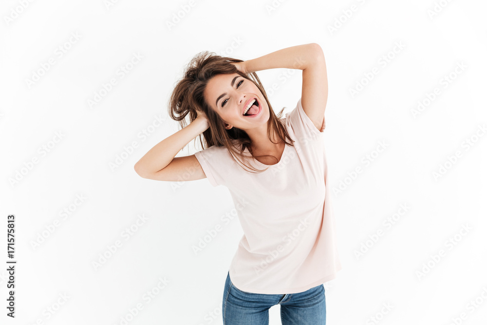 Funny playful woman playing with hair and looking at camera Funny playful woman playing with hair and looking at camera