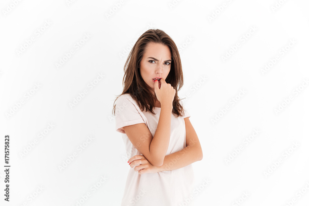 Angry pensive woman looking at the camera Angry pensive woman looking at the camera