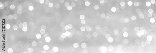 silver and white bokeh lights defocused. abstract background