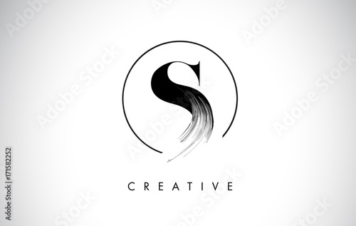 S Brush Stroke Letter Logo Design. Black Paint Logo Leters Icon. photo