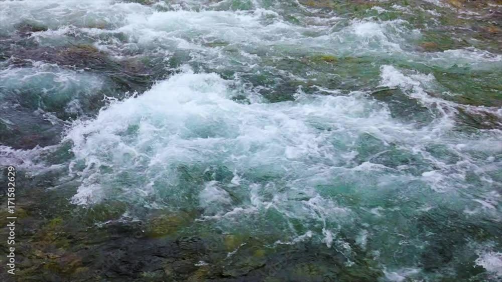 Mountain river water with slow motion closeup Mountain river water with slow motion closeup
