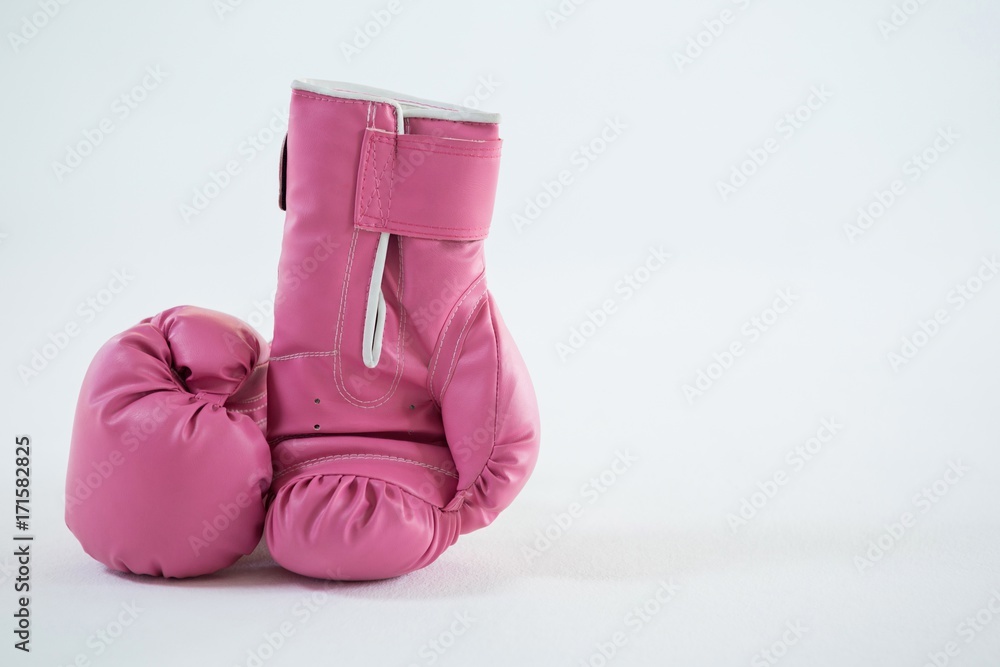 Close-up of pink boxing gloves pair