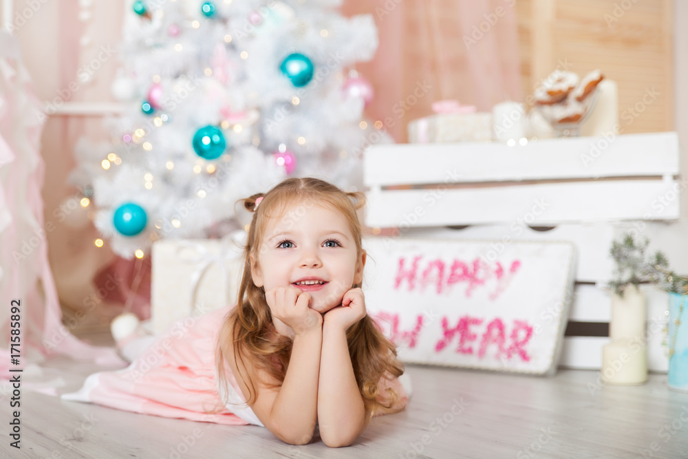 Cute girl in a Christmas decorations