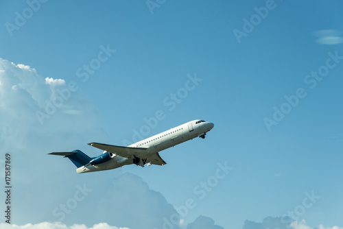 Airplane on blue sky 