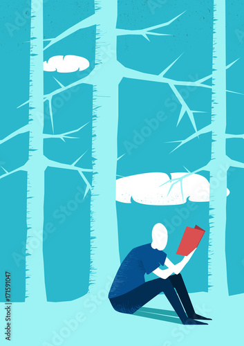 Man reading a book in the forest