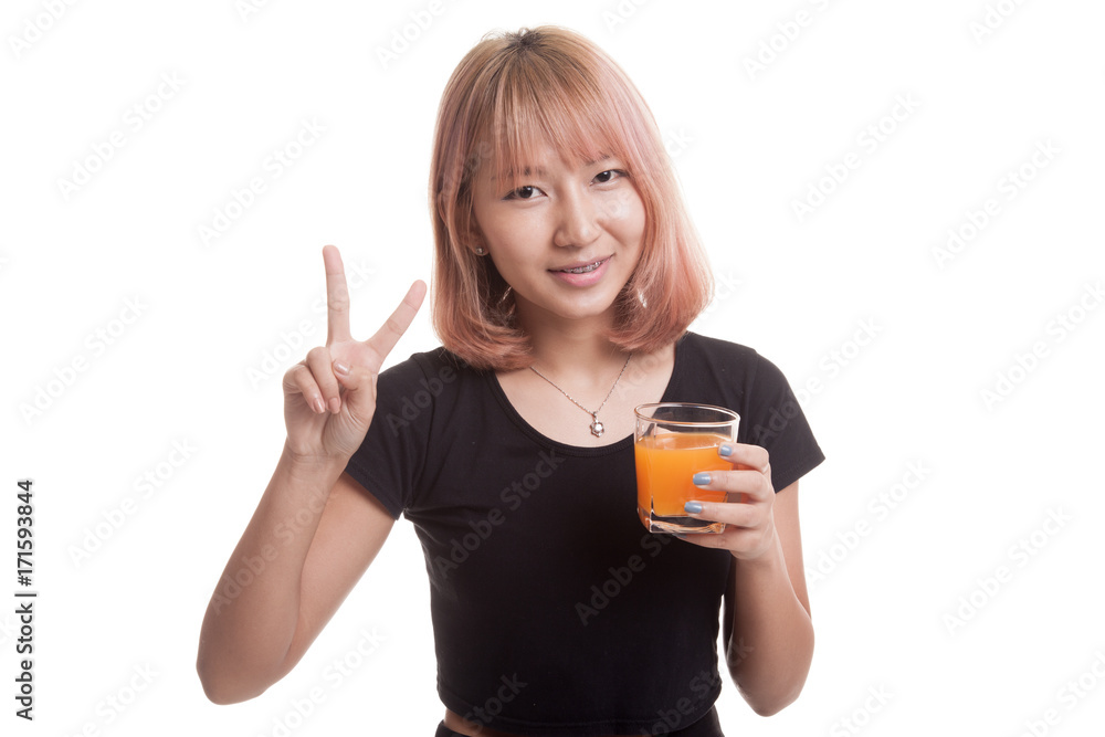Young Asian woman show victory sign drink orange juice. Young Asian woman show victory sign drink orange juice.