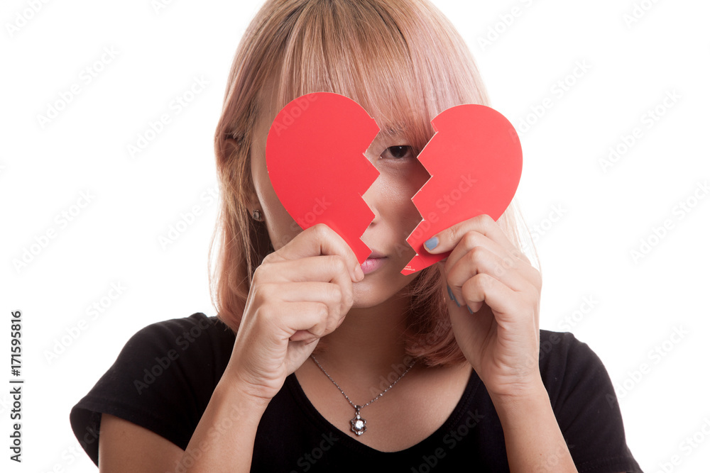 Beautiful young Asian woman with broken heart. Beautiful young Asian woman with broken heart.