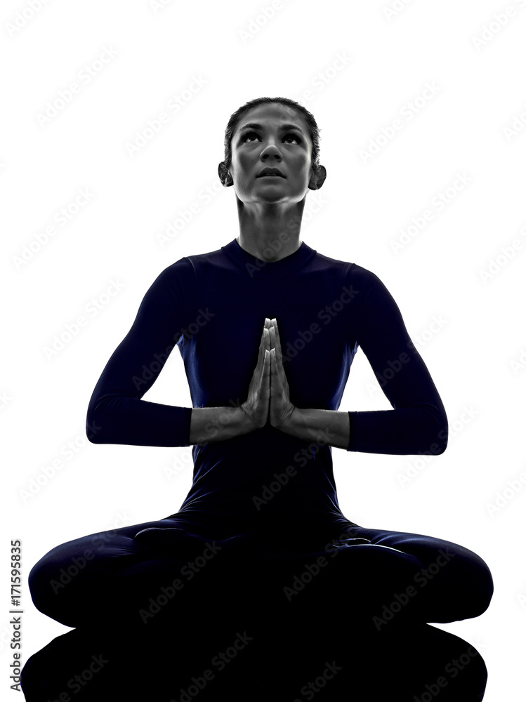 woman exercising Padmasana lotus pose yoga silhouette shadow white  background Stock Photo
