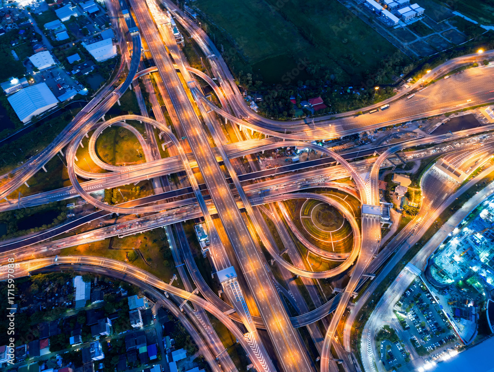 Bangkok Expressway top view, Top view over the highway,expressway and motorway at night, Aerial view interchange of a city, Shot from drone, Expressway is an important infrastructure in Thailand Bangkok Expressway top view, Top view over the highway,expressway and motorway at night, Aerial view interchange of a city, Shot from drone, Expressway is an important infrastructure in Thailand
