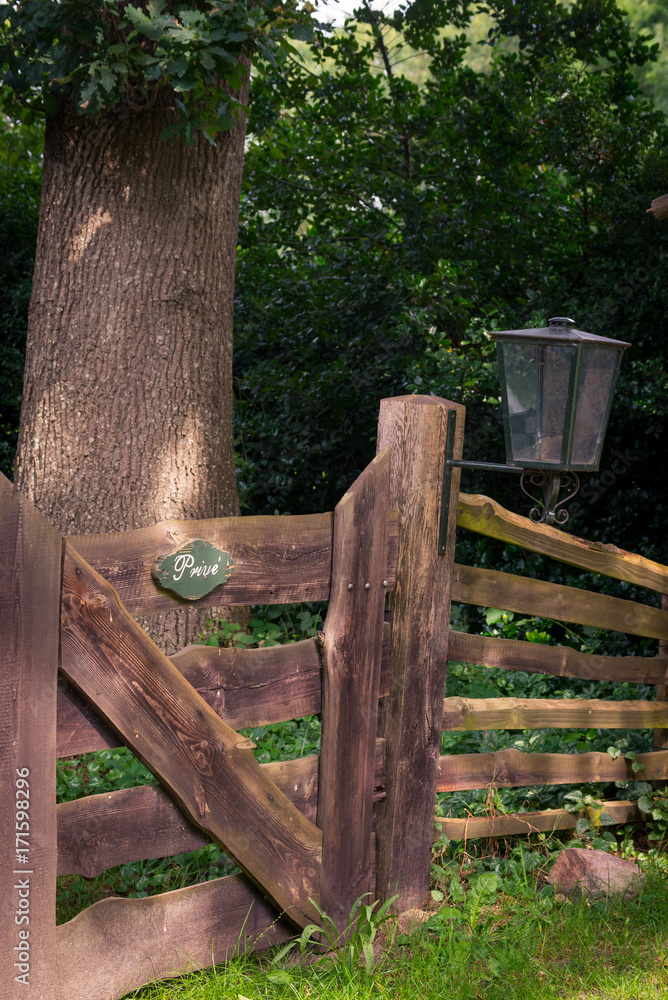 Scene with a fence and a lantern Scene with a fence and a lantern