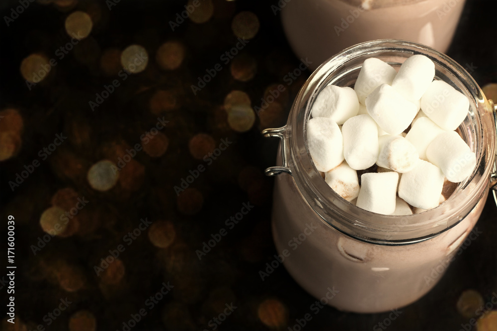 cocoa with marshmallow on a black background. cocoa with marshmallow on a black background.