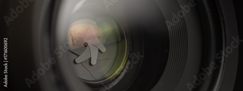 Camera Lens Close Up. DSLR Shutter Background.