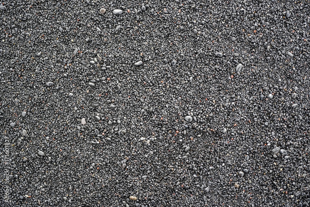 Black stones on a black beach in Iceland texture Black stones on a black beach in Iceland texture