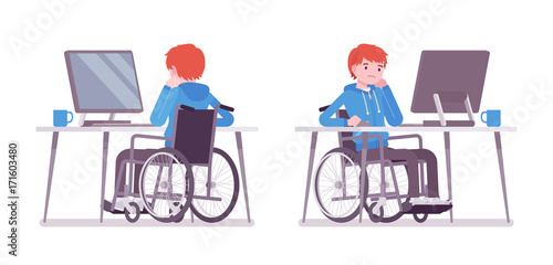 Male young wheelchair user working with computer
