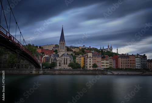 The Church of Saint Georges at the shore of the Saone river in Lyon during autumn weather.