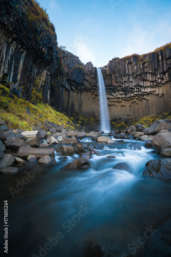 Fototapeta Naklejka Na Ścianę i Meble -  Svartifoss waterfall in Skaftafell national park in Iceland, Famous Svartifoss waterfall. Another named Black fall. Located in Skaftafell.