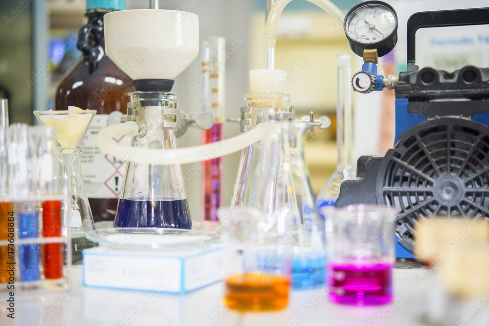 Chemical filtration with Buchner funnel bushings using a vacuum pump