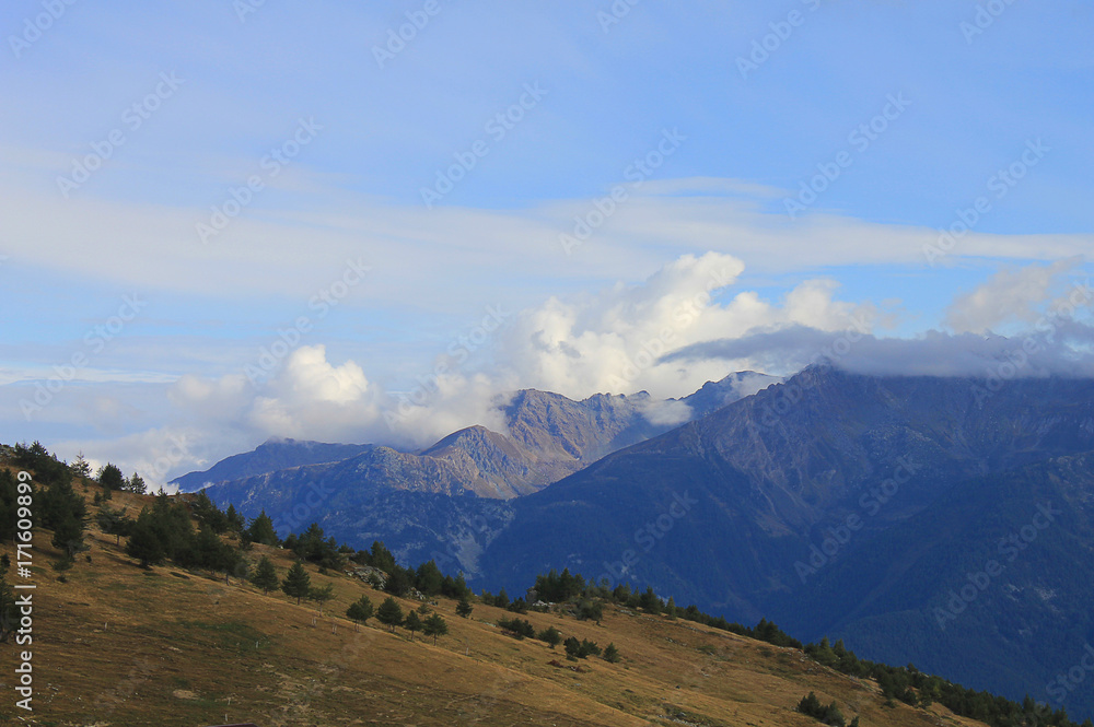 mountain landscape in summer with clouds