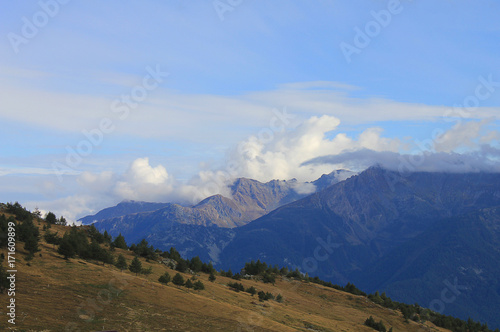 mountain landscape in summer with clouds