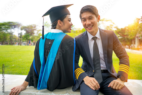 Portrait of Asian graduate woman with her lover