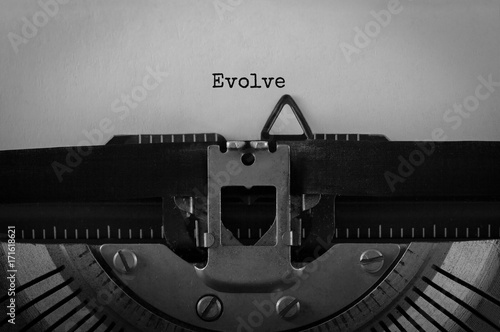 Text Evolve typed on retro typewriter