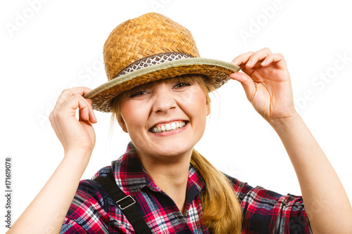 Portait smiling woman wearing sun hat and shirt