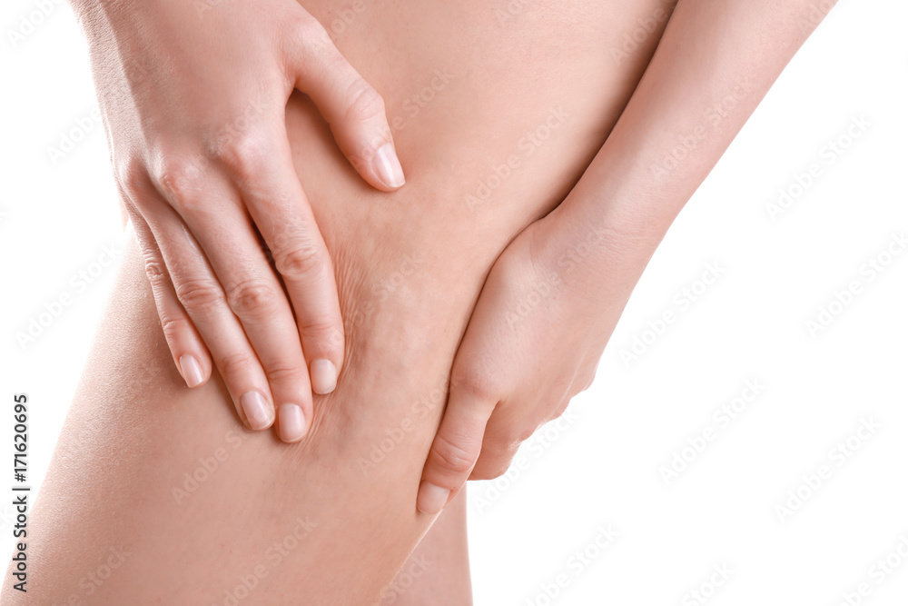 Woman with cellulite problem on white background