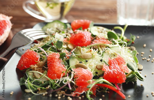 Superfood salad with cucumber and grapefruit, closeup