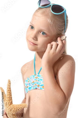 Cute little girl with shell...