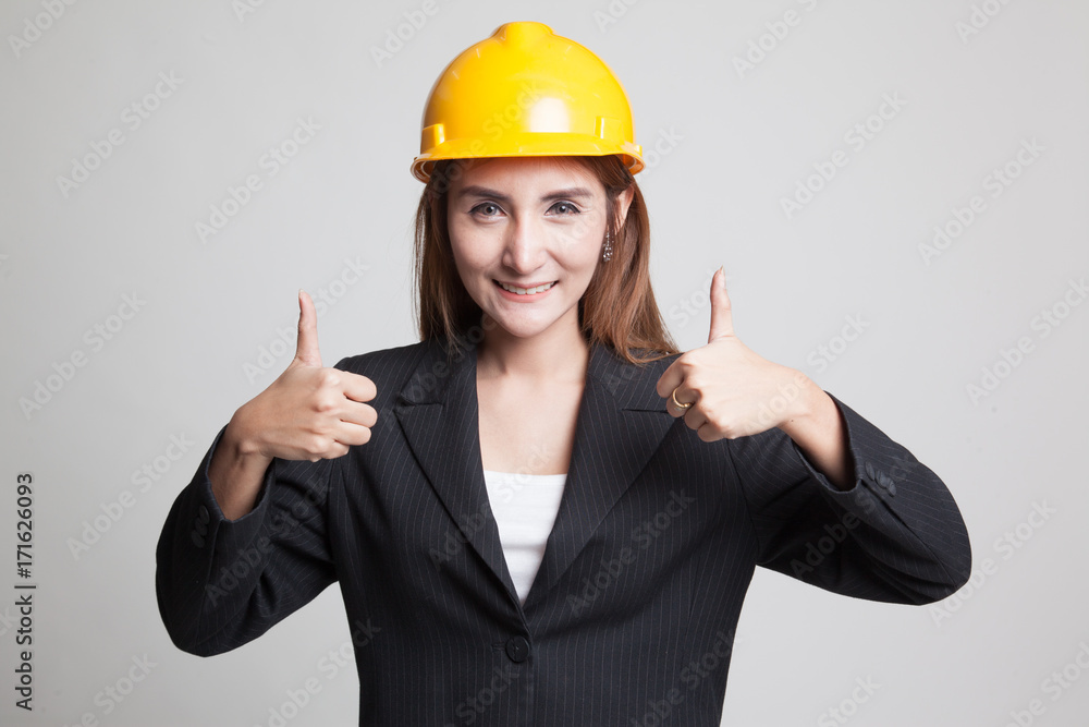 Asian engineer woman thumbs up with both hands. Asian engineer woman thumbs up with both hands.
