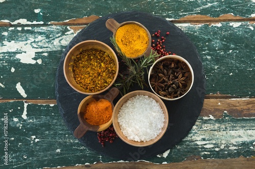 Various spices arranged in board