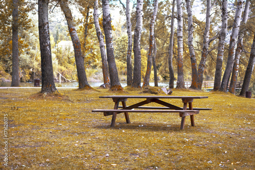 Picnic table in an fall landscape