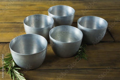 Plastic bowls and rosemary herb