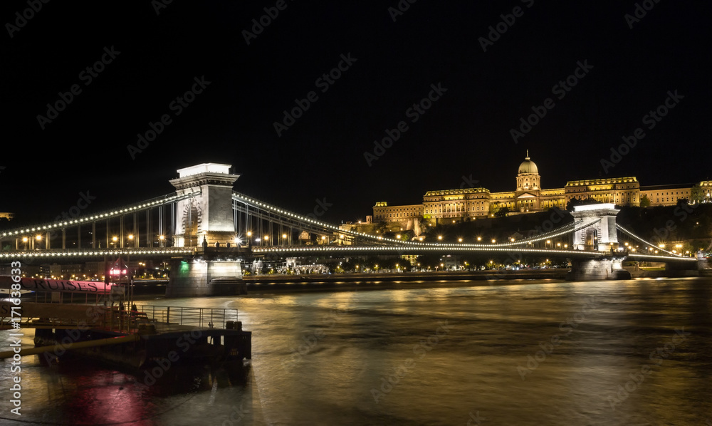 Panoramic view of city centre of Budapest over the river Danube, Hungary at night