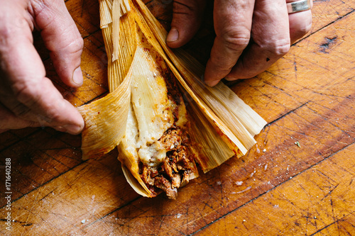 Masa Tamale in corn husk photo