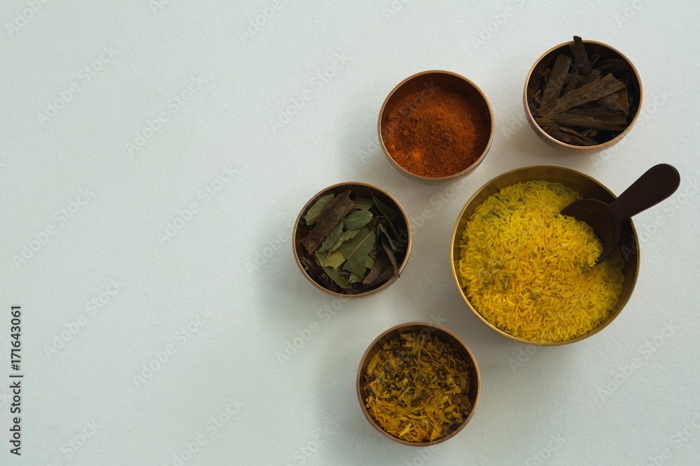Various spices in bowl on white background Various spices in bowl on white background