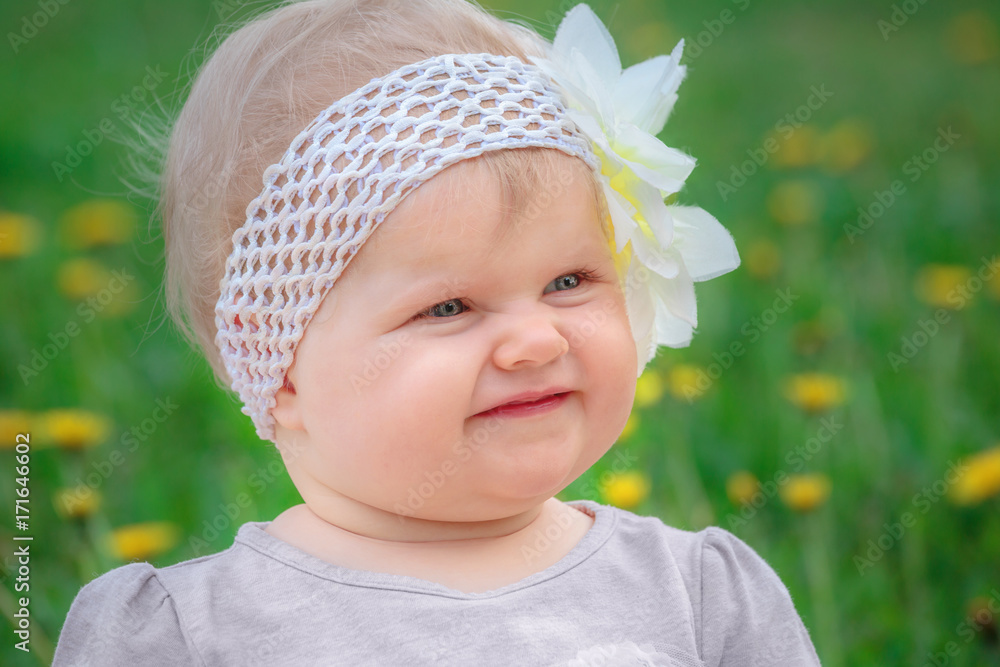 Little girl laughing. A cute little girl. Little girl laughing. A cute little girl.