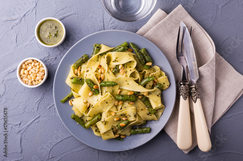 Vegetarian pappardelle pasta with green bean, pesto, pine nuts photo